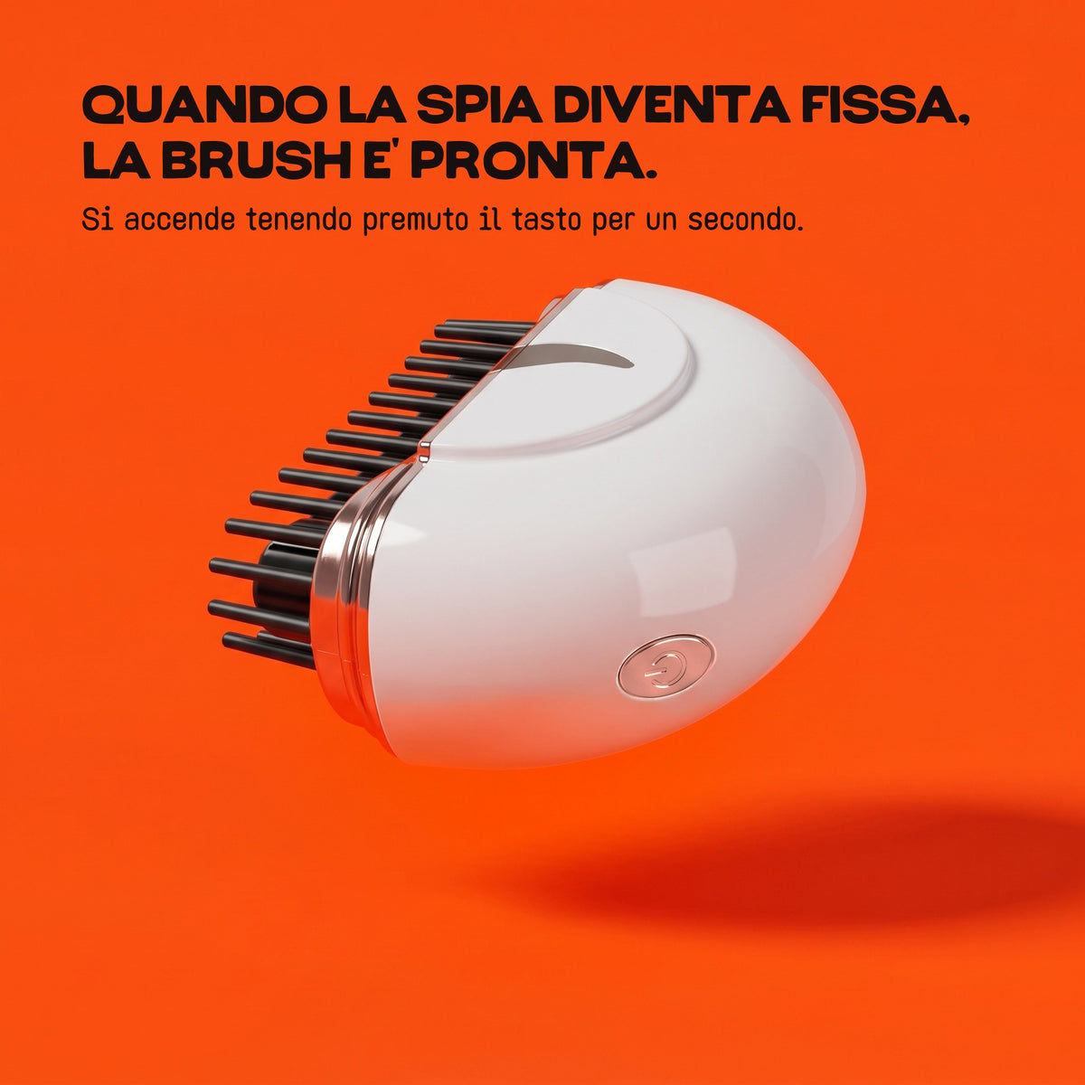La HairSnapper Brush Aurora Pearl di lato con il tasto: quando la spia diventa fissa, la Brush è pronta