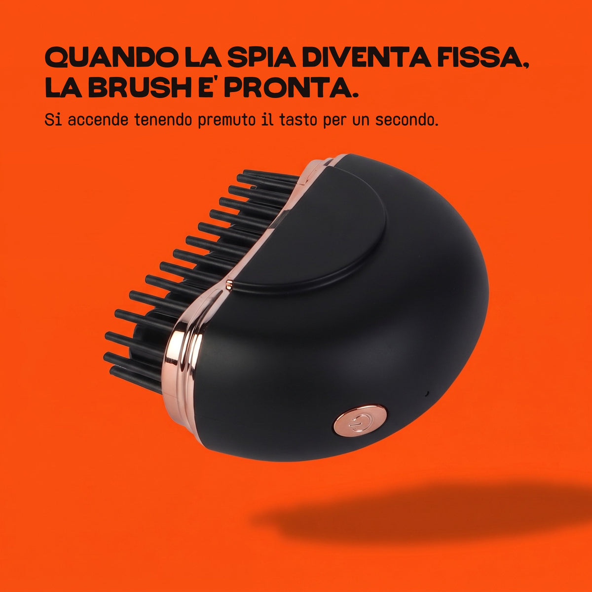 La HairSnapper Brush Midnight Gold di lato con il tasto: quando la spia diventa fissa, la Brush è pronta