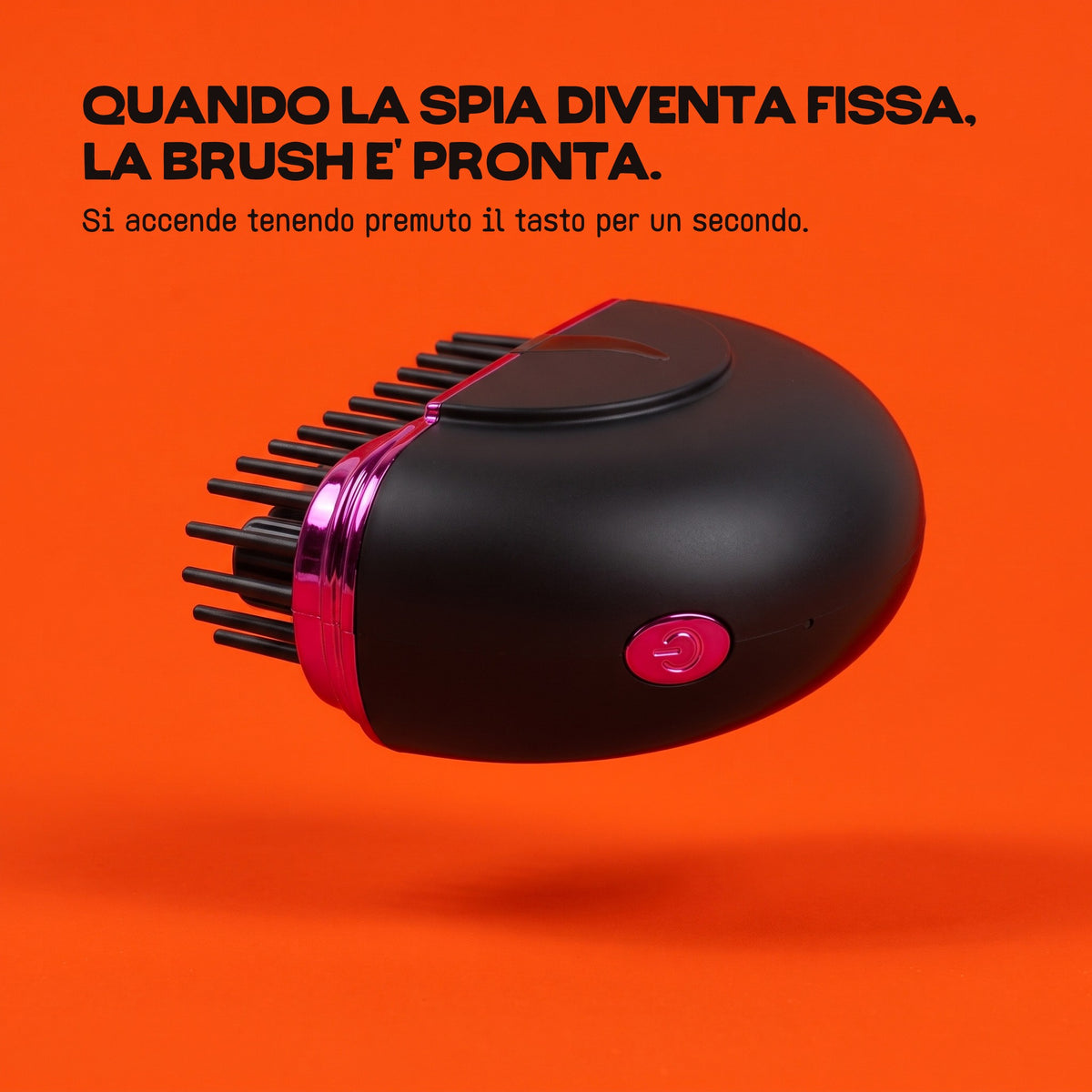 La HairSnapper Brush Velvet Purple di lato con il tasto: quando la spia diventa fissa, la Brush è pronta